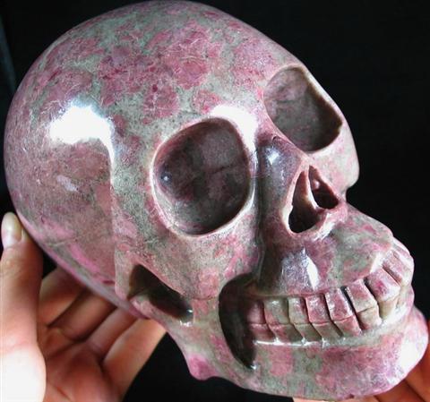 Rhodonite Skull  helps you achieve your potential 977